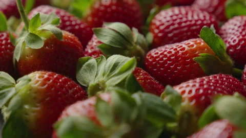 Strawberries fresh red fruit rotating loop side angle Stock Footage 138790517