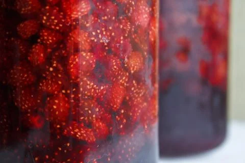 Strawberries fruit jam close-up. Stock Photos