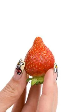 Strawberries in hand Stock Photos