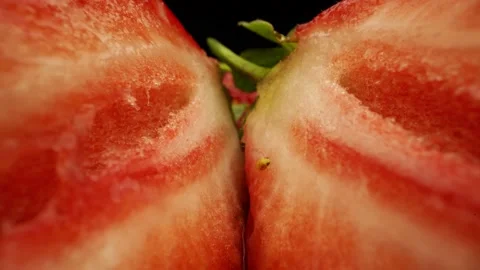 Strawberries insides On Black Background Stock Footage 131800534