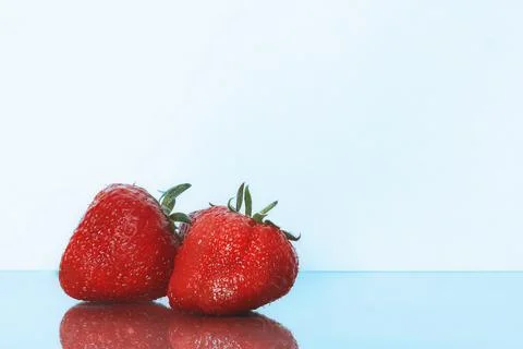 Strawberries isolated. Strawberry with leaf isolate. Two whole strawberries o Stock Photos