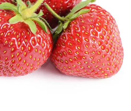 The strawberries isolated on white background Stock Photos