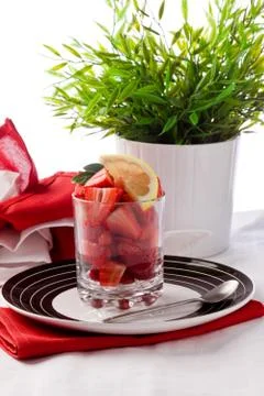 Strawberries with lemon Stock Photos