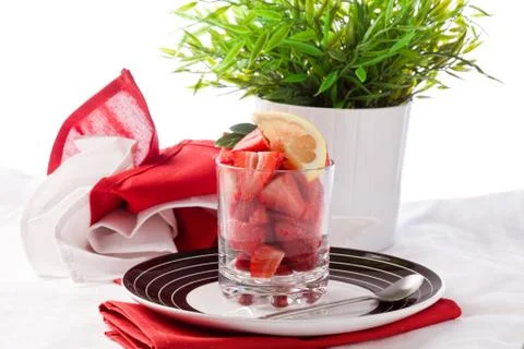 Strawberries with lemon Stock Photos
