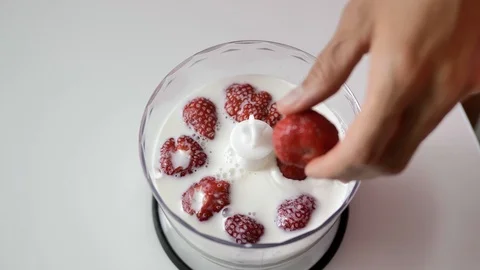 Strawberries in milk Stock Footage 114304968