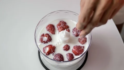 Strawberries in milk Stock Footage 114305027