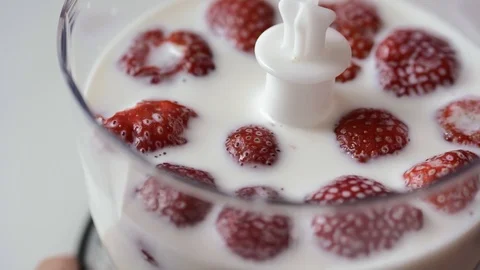 Strawberries in milk Stock Footage 114305089