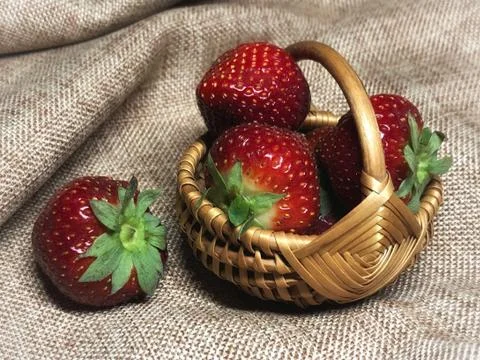 Strawberries in mini basket Stock Photos