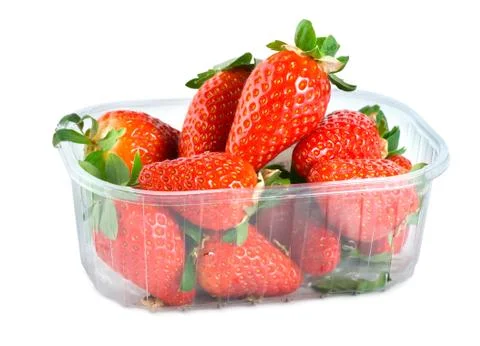 Strawberries in plastic container Stock Photos