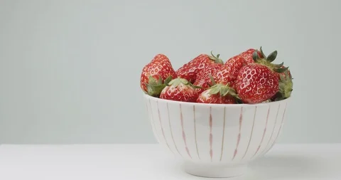 Strawberries on a plate Stock Footage 127084711