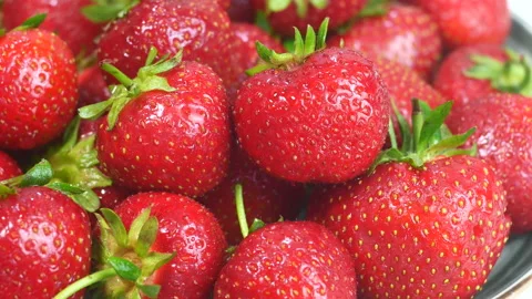 Strawberries on a plate Stock Footage 235188066