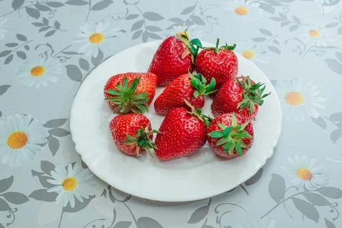Strawberries on a plate Stock Photos
