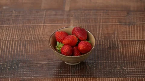 Strawberries on plate studio shot Stock Footage 183499219