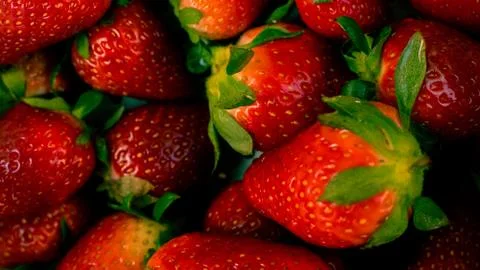 Strawberries on a pot Stock Photos