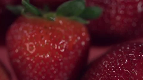 Strawberries on red background macro Video stock 150479503
