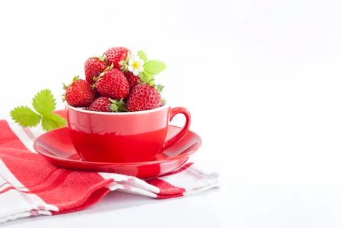 Strawberries in red cup Stock Photos