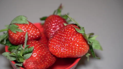 Strawberries in a red plate. Overall plan. Stock Footage 262709076