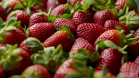 Strawberries rotating loop fresh red Stock Footage 138785374