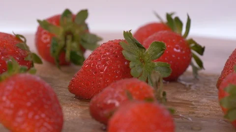 Strawberries Rotating over white Background. Strawberries, fruits Stock-Footage 127937197