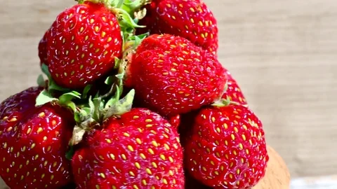 Strawberries on rotating plate Stock Footage 77116978