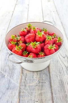 Strawberries in a sieve Stock Photos