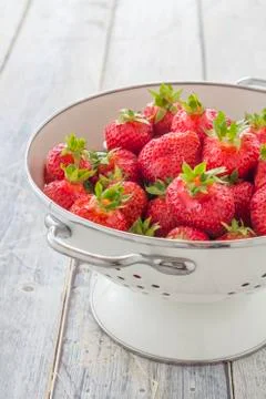 Strawberries in a sieve Stock Photos