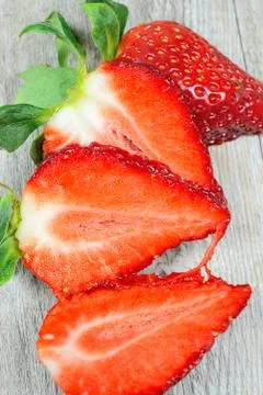 Strawberries sliced Stock Photos