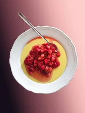 Strawberries sugared on vanilla pudding Stock Photos