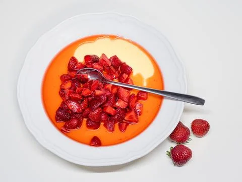 Strawberries sugared on vanilla pudding Stock Photos