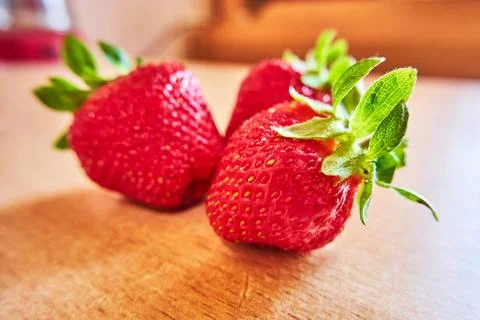 Strawberries on the table close-up shot Stock Photos