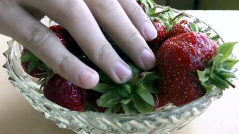 Strawberries to take from the plate Stock Footage 77841769