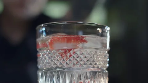 Strawberries in a transparent glass Stock Footage 129087617