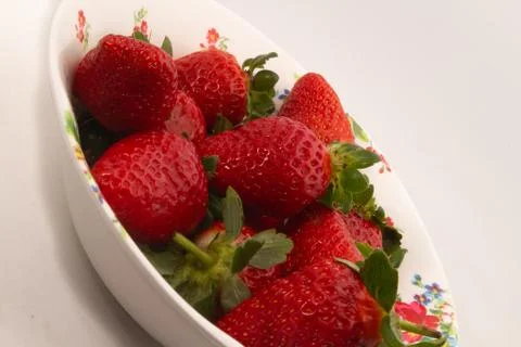 Strawberries on a white background Stock Photos