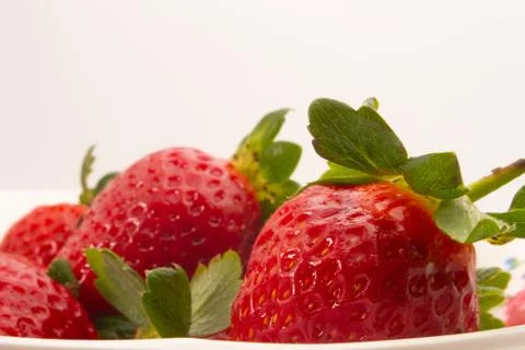 Strawberries on a white background Stock Photos