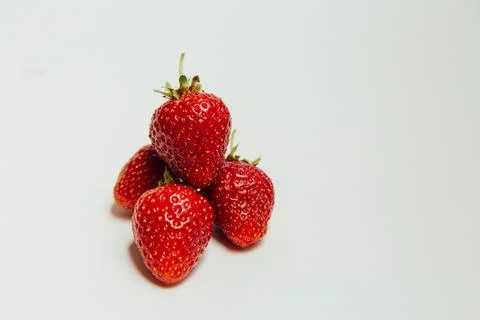 Strawberries on a white background Stock Photos