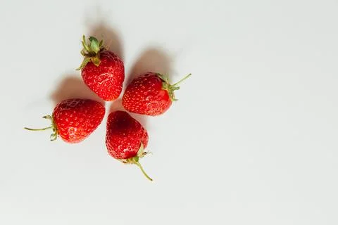 Strawberries on a white background Stock Photos