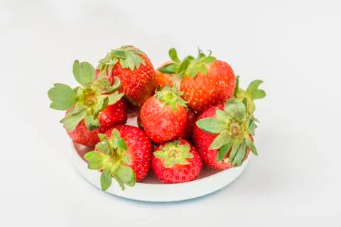 Strawberries on white Stock Photos