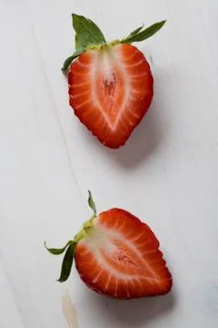 Strawberries on white table Stock Photos