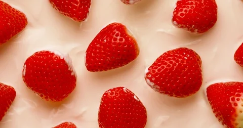 Strawberries in yogurt Stock Footage 124486210