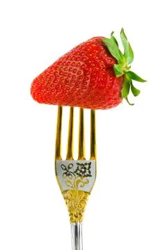 Strawberry and fork Stock Photos