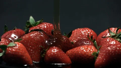 Strawberry and honey 4k 120fps Stock Footage