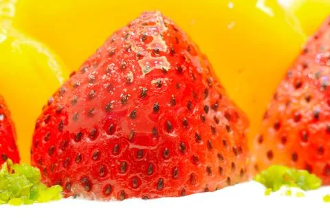 Strawberry and mango on the cake Stock Photos