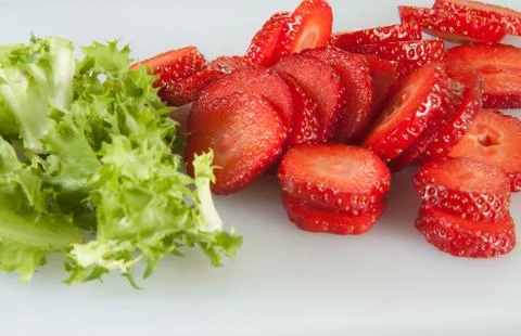 Strawberry and vegetable macro Stock Photos