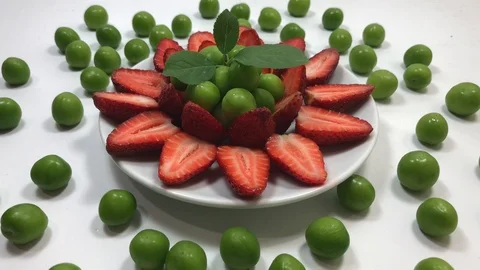 Strawberry ans plum. Stock Footage 90301192