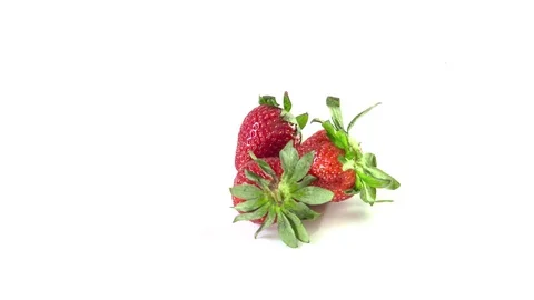 Strawberry berries isolated on a white background rotate 360 degrees Stock Footage 129268936