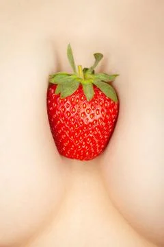 Strawberry between breasts Photos