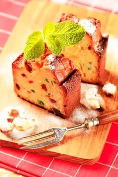 Strawberry bundt cake slice with mint garnish Stock Photos
