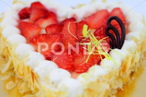 Strawberry cake close-up. Stock Photos