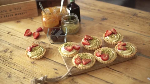 Strawberry cake on table Stock Footage 75176477