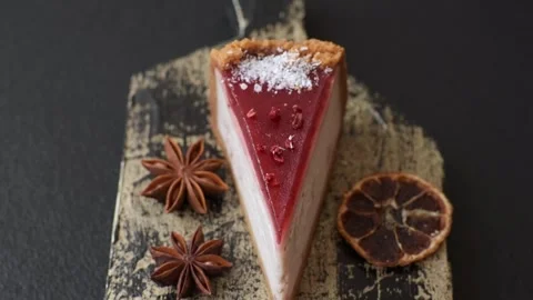 Strawberry cheesecake, a slice of sweet pie, a classic cheesecake dessert. Straw Stock Footage 321416083